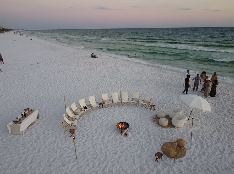 Beachy Luxe bonfire setup on the beach